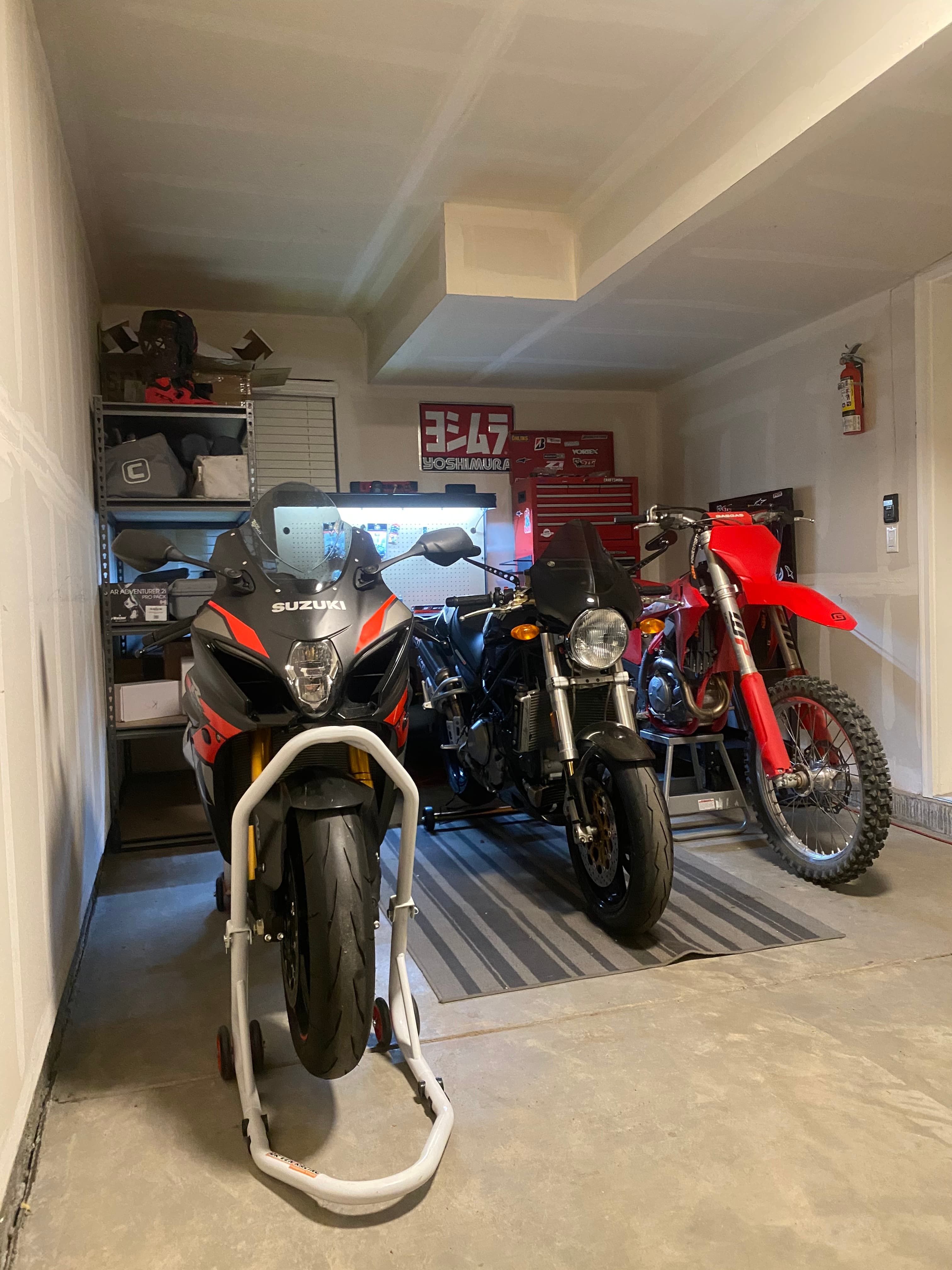 Frank Bernardo in the garage behind Blackflag Moto